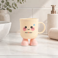 Rosa Macaron Zahnputzbecher mit Cartoonmotiv als Produktansicht