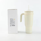 Beiger Macaron Isolierbecher 1200 ml mit Originalverpackung