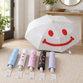 Happy Mood Automatik Taschenschirme in einer hellen Eingangsszene