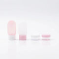 4-teiliges Reise-Flaschenset für Kosmetik, verschiedene Behälter (Rosa/Weiß)