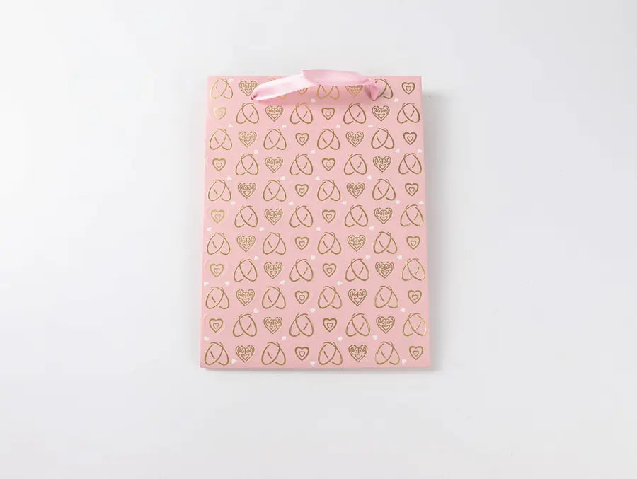 Rosa Geschenktasche mit Herzfolienprägung in Größe S