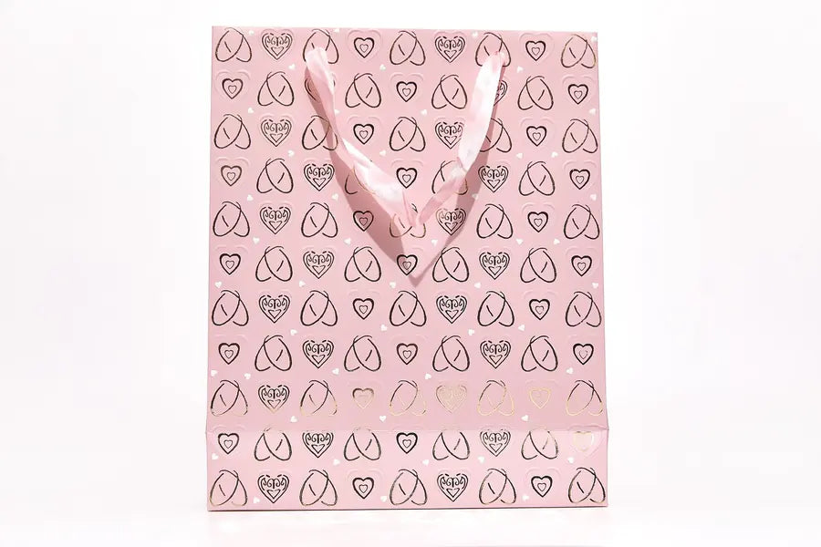 Rosa Geschenktasche mit Herzfolienprägung in Größe M