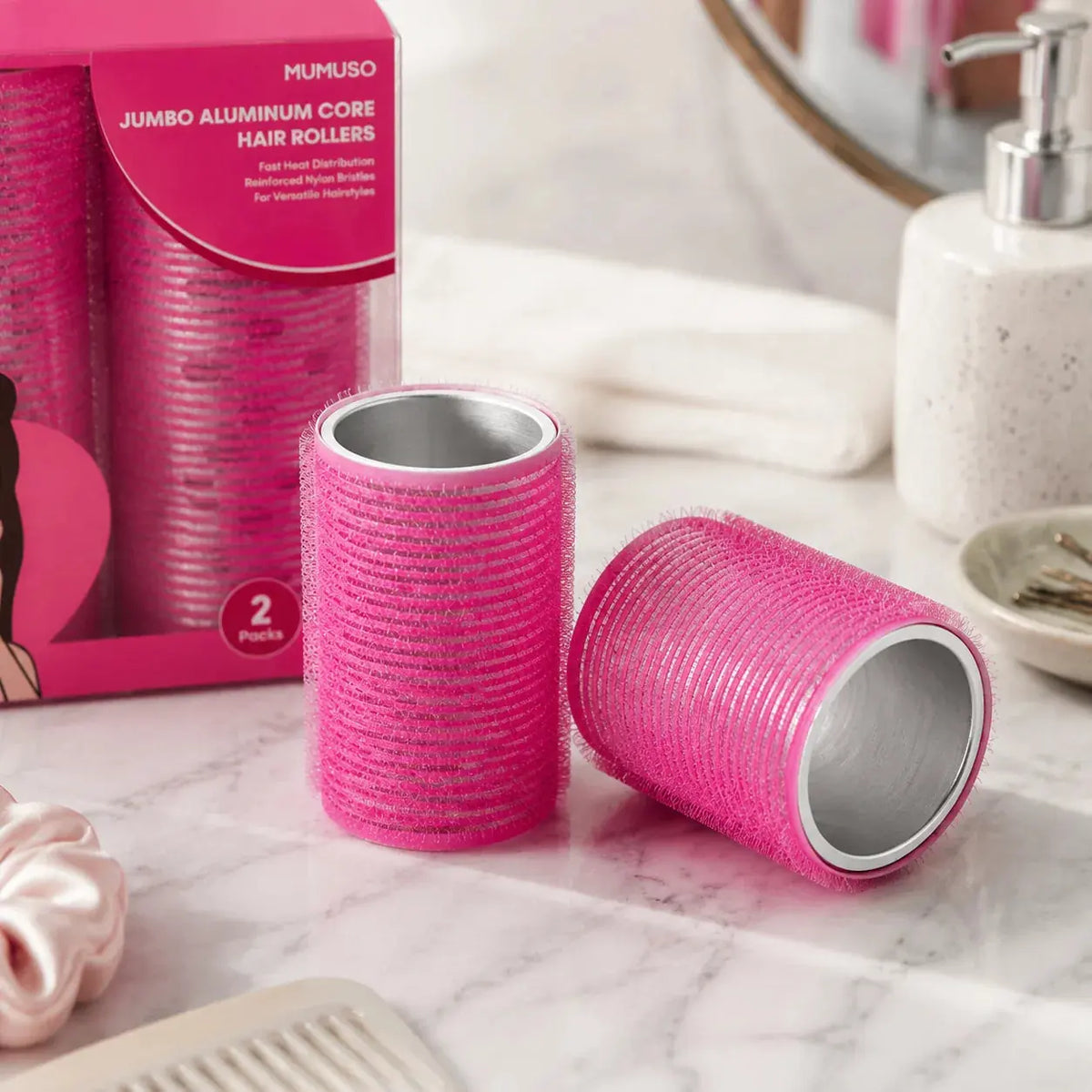 Zwei pinke MUMUSO Jumbo Haarwickler mit sichtbarem Aluminiumkern