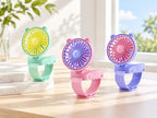Cartoon Ventilator mit Handgelenkschlaufe in drei Farben als Lifestyle Szene
