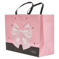 Geschenktasche mittelgroß aus Papier mit Schleifen-Design (Rosa/Schwarz)