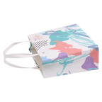 Kleine Geschenktragetasche aus Papier mit abstraktem Print (Mehrfarbig)