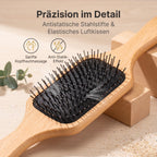 Detailansicht der Stahlstifte und des elastischen Luftkissens der MUMUSO Haarbürste
