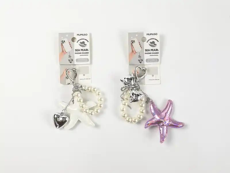 Zwei Sea Pearl Handy Anhänger mit Verpackung